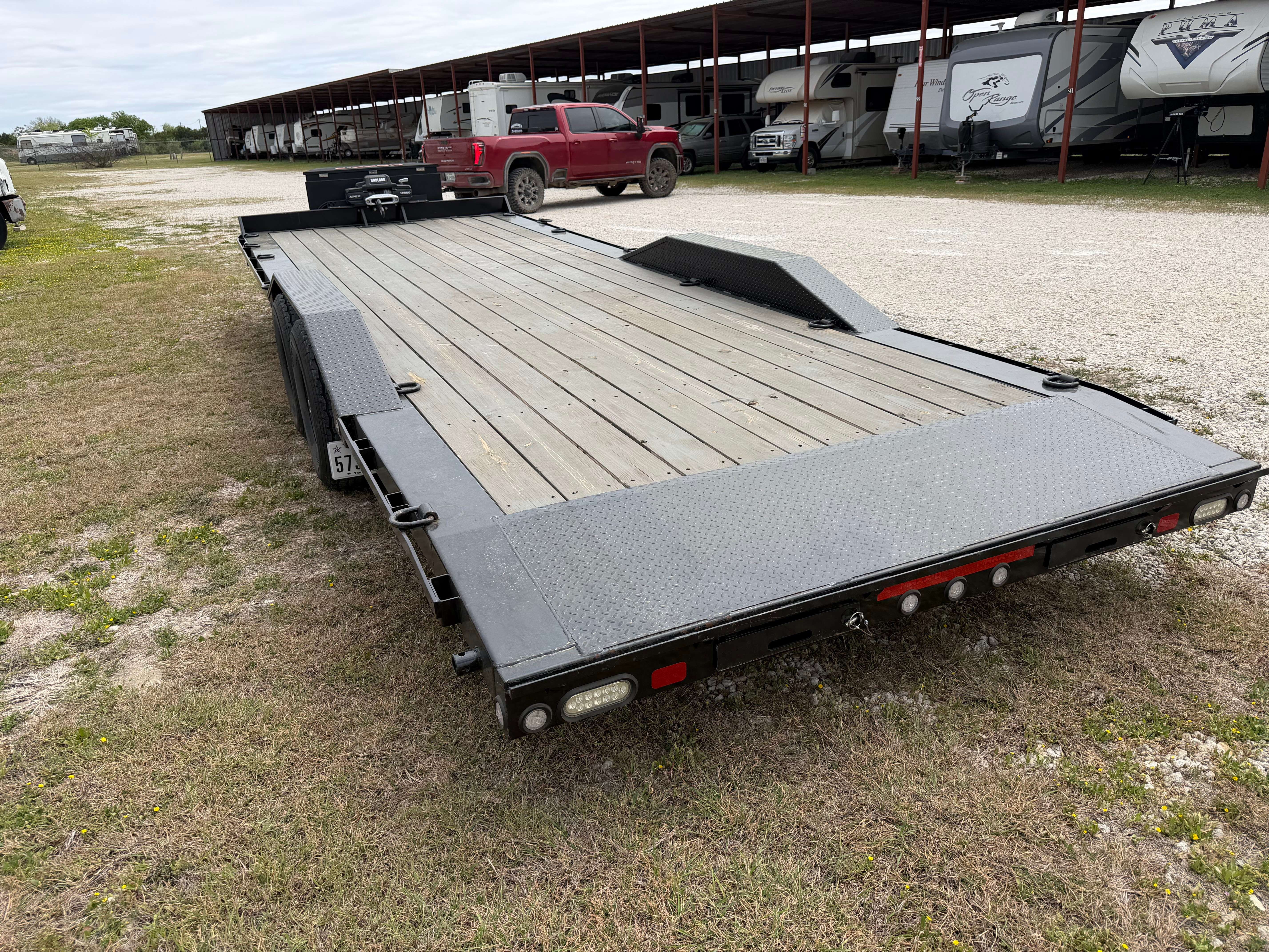 Maxx-D car hauler overhead view showing full 24ft wood deck