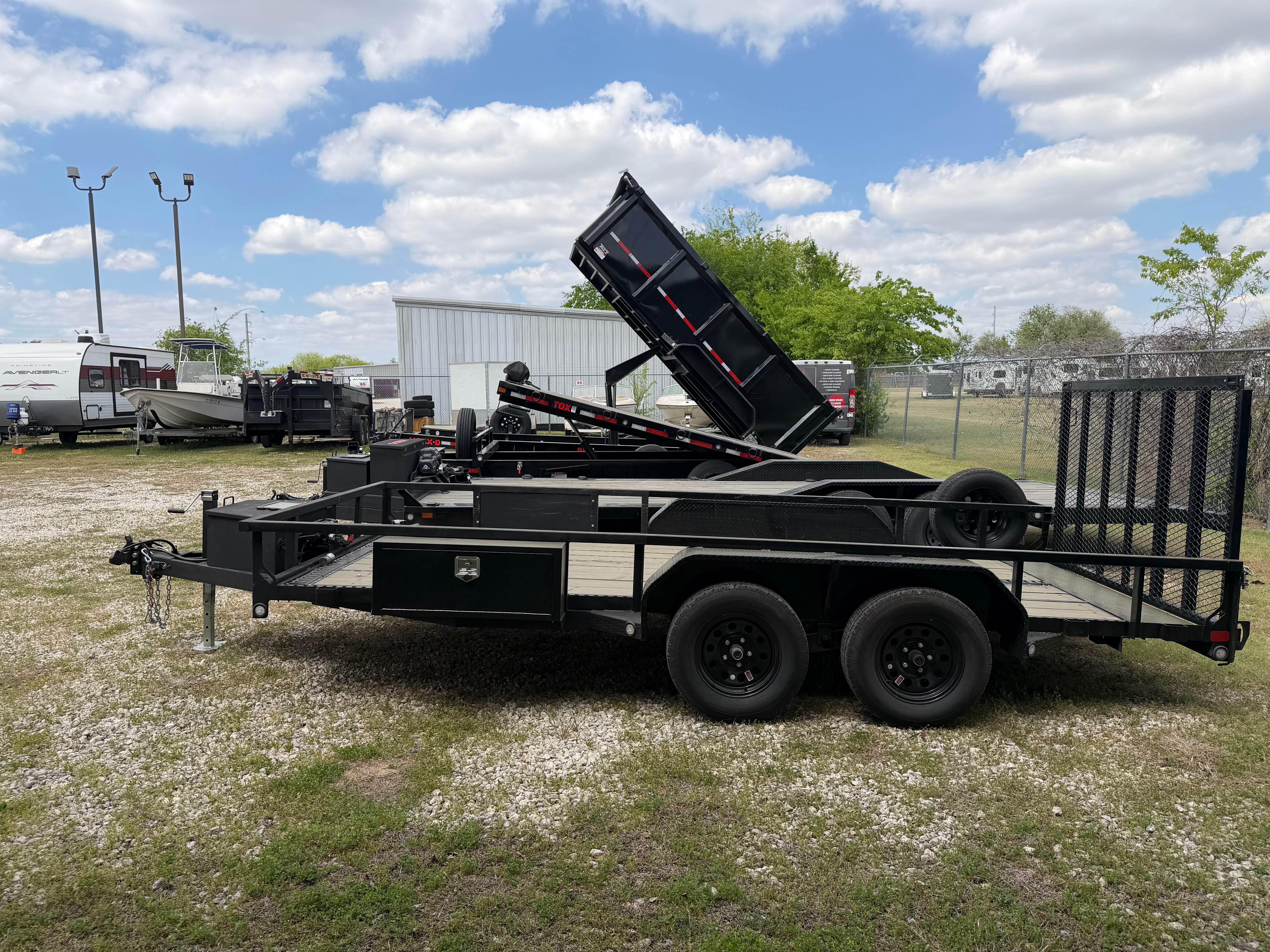 Maxx-D U3X utility trailer parked beside dump trailer in Leander TX